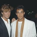 Singers George Michael (left) and Andrew Ridgeley of pop duo Wham!, at the premiere of the film 'Dune', London, England, 1984. (Photo by Fox Photos/Hulton Archive/Getty Images)