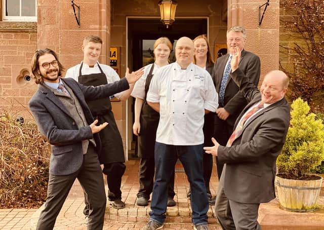 Head chef Iain Gourlay celebrates with staff at Cringletie House.