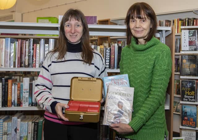 Galashiels librarians Alison Blake and Debbie McGill are among those now encouraging readers to return overdue books without fear of being fined.