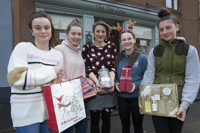 Jodie Liddle, Maddison Elliott, Natasha Shewan, Khiara- Louise O'Neill and Caitlin Shewan collect donations at the Tea Cosy cafe in Earlston.