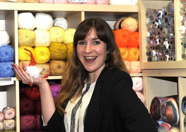 Naomi Harrod, owner of The Wool Shop in Galashiels, with one of the 150-odd knitted elves made and sold in aid of the children's ward at the BGH.