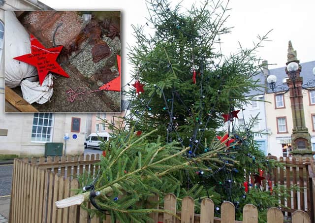Jedburgh's Christmas tree vandalised overnight on Christmas eve. Inset Memory Stars strewn on the ground (pic by Bill McBurnie)