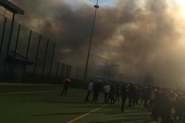 This photo, taken by one of the pupils, shows Peebles High School enveloped by thick smoke.