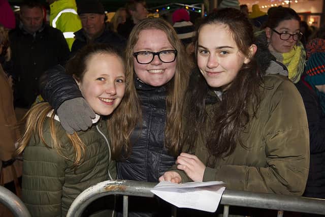 Waiting for Santa at Hawick are Grace Collinson, Zara Gilfether and Amy O'Rourke.