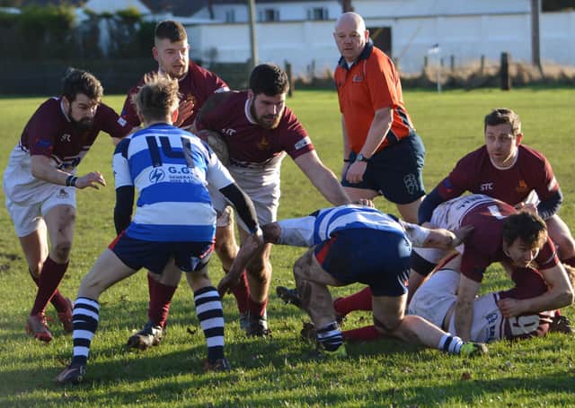 Gala, in maroon, tussle with Borders neighbours Earlston (picture by Brian Gould)
