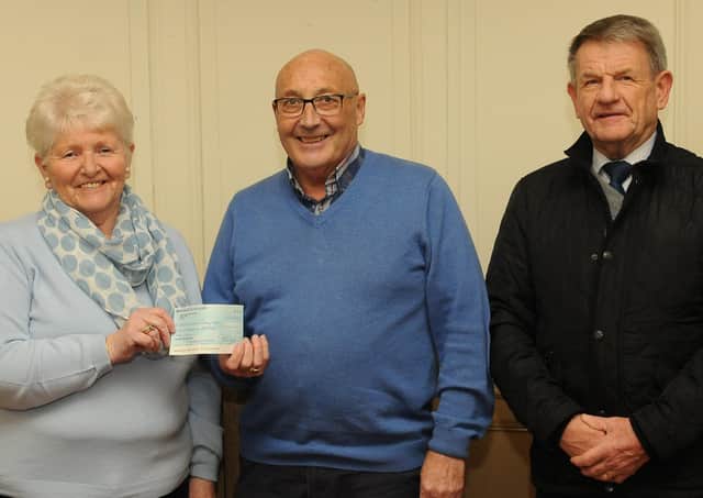 Prior to a meeting of Selkirk Common Riding Trust, Sheila Lockie and Jake Wheelans, from Selkirk Common Riding booklet committee, presented trust provost Keith Miller with a cheque for £1,000 – part of the profits generated by last year’s booklet.