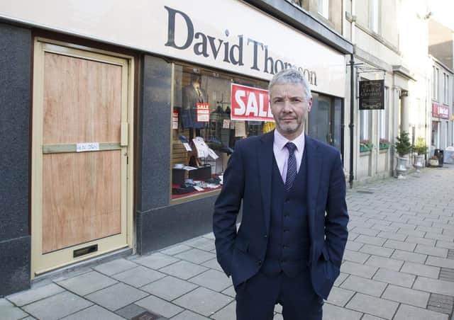 Mark Fotheringham, employee of more than 30 years, outside David Thomson and Son outfitters in Jedburgh.