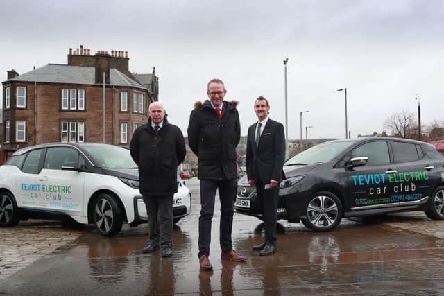 Ian Johnston, district general manager for SP Energy Networks, with Borders MP John Lamont and Andy Maybury, project manager for Teviot Electric Car Club, at the initiative's launch in Hawick.