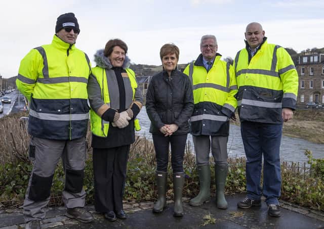 Hawick Flood Group volunteers Andy Lewis, Marion Chrystie, Stuart Marshall and Mick Robertson with First Minister Nicola Sturgeon.