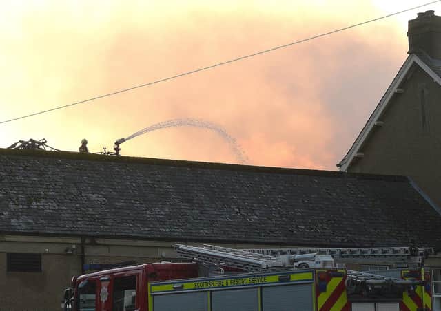 The fire at Peebles High School in November has put extra pressures on the council's budget.