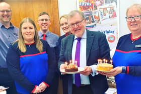 Staff at a Peebles building society branch used the occasion of their Eastgate premises’ 40th birthday to raise funds for Parkinson’s UK.
Tweeddale MP David Mundell, who was holding one of his regular surgeries in the town, dropped in to join employees and customers celebrating the anniversary at the Nationwide branch, previously part of the Dunfermline Building Society. Pictured, from left, Angus MacIntyre (financial planning manager), Laura Dawkins (member representative), Scott Menzies (branch manager), Joyce MacIntyre (member representative), David Mundell and Linda Volpe (member representative).