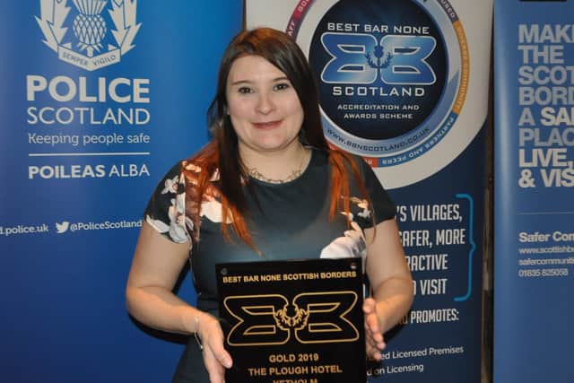 The Plough Hotel at Yetholm was among the winners at this year's Best Bar None award ceremony for the Borders, held at the Buccleuch Arms in St Boswells. Pictured with its award is senior barmaid Emma Redpath.