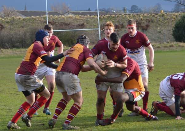 Gala YM aim to force their way through the Medics' lines (picture by Brian Gould)