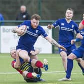 Hawick Linden, in action earlier this term against Broughton, were relegated from East Regional Dvision One before the shutdown and the eventual decision to nullify the season (library image)