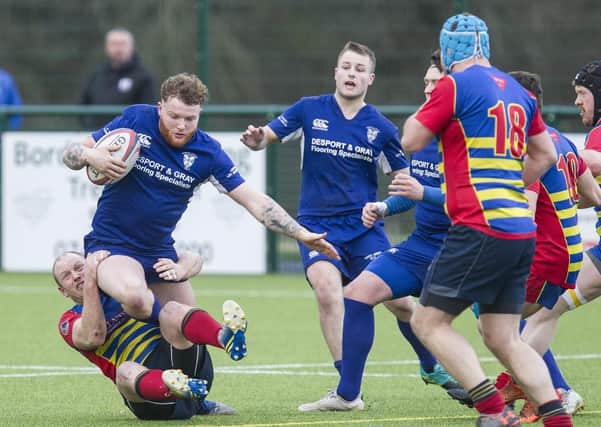 Hawick Linden, in action earlier this term against Broughton, were relegated from East Regional Dvision One before the shutdown and the eventual decision to nullify the season (library image)