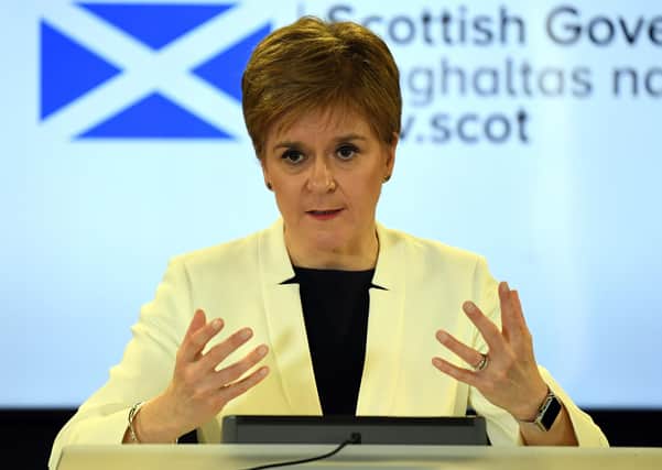 Scotland's first minister, Nicola Sturgeon, holding a briefing on the spread of Covid-19 nationwide. (Photo by Andy Buchanan/Pool/AFP via Getty Images)