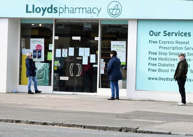These customers are respecting each other and the new social distancing rules but some pharmacists have been verbally abused and witnessed fights outside their premises. (Pic: Michael Gillen)