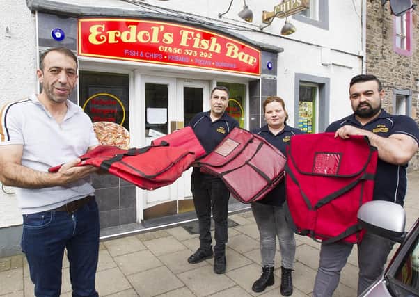 Erdol's Fish Bar boss Erdal Orak with Onder Ouven, Gheorghe Cristina and Osman Amet.
