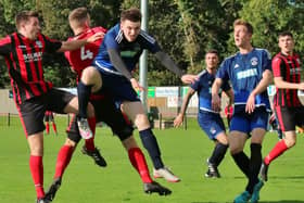Vale of Leithen, in blue, and Dalbeattie Star, in action in a previous encounter, are separated by just three points at the foot of the Lowland League.
