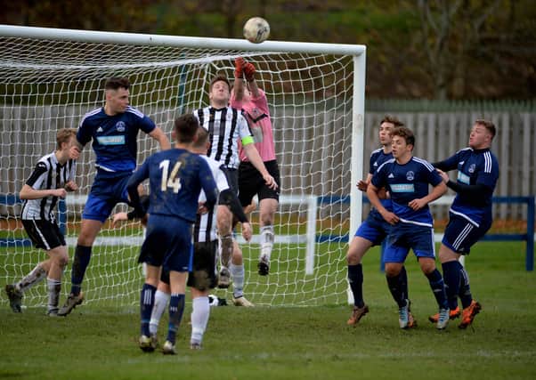 Vale of Leithen, seen here pressurising the Upper Annandale goal in 2017, will be in the Lowland League next term (archive image by Alwyn Johnston)