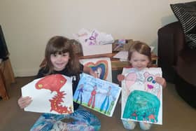 Lily, 6, and Phoebe, 3, Jackson from Hawick with their artistic efforts.