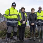 Hawick Volunteer Flood Group members Andy Lewis, Marion Chrystie, Stuart Marshall and Mick Robertson showing Scottish first minister Nicola Sturgeon a stretch of the Teviot set to be kept at bay by forthcoming river defences during her visit to the town in February
