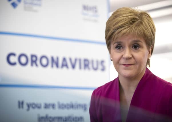 Scotland's first minister, Nicola Sturgeon, at the NHS 24 contact centre at the Golden Jubilee National Hospital in Glasgow. (Photo by Jane Barlow/pool/AFP via Getty Images)