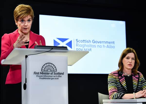 Scottish first minister Nicola Sturgeon and chief medical officer Catherine Calderwood announcing yesterday's coronavirus figures. (Photo by Jeff J Mitchell/Getty Images)