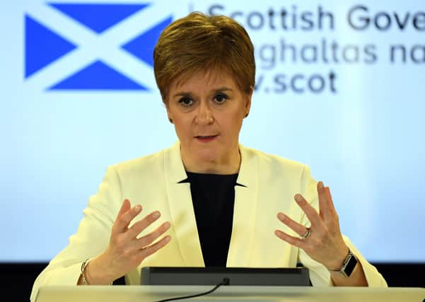 Scotland's first minister, Nicola Sturgeon, holding a briefing in Edinburgh today on the Covid-19 outbreak spreading through the country. (Photo by Andy Buchanan/Pool/AFP via Getty Images)