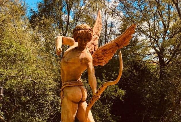 Nothing stupid about this cupid...incredible artwork at Branxholm Park is among Mark's favourites. The old lime tree had split and was facing the chop but Mark carved out a whole new life for it.