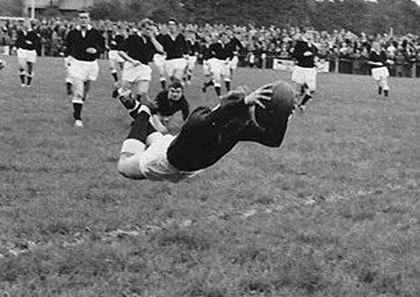 Lyall Houghton dives over the line at Netherdale to score for Gala against Hawick in 1968.