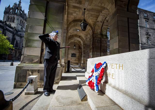 Tony Hooman pays his respects ahead of VE Day, in Edinburgh yesterday. Please credit: Mark Owens/Poppyscotland.