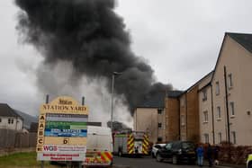 Firefighters tackling a blaze at Innerleithen's Station Yard last year.
