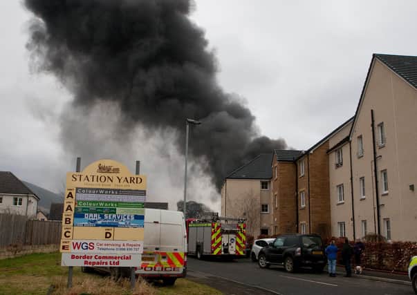 Firefighters tackling a blaze at Innerleithen's Station Yard last year.