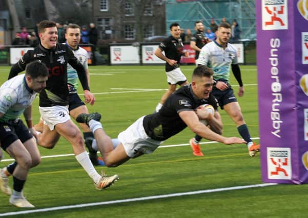 Tom Galbraith scores a try back in January for the Southern Knights against Boroughmuir Bears (library picture)