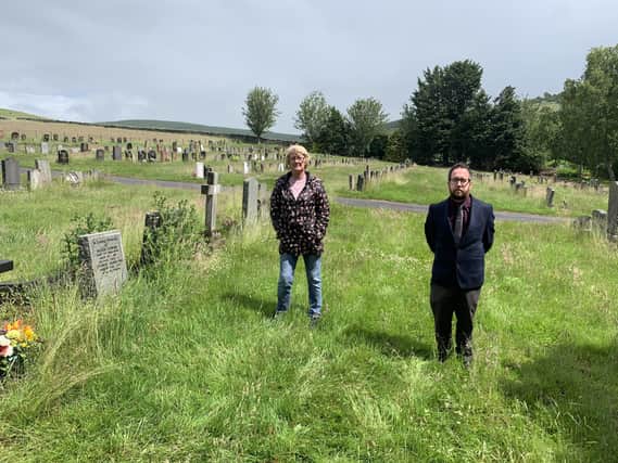 Barbara Stewart and Councillor Euan Jardine in the overgrown Heatheryett Cemetery in Galashiels.
