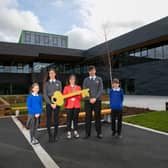 Jedburgh Grammar Campus headteacher Susan Oliver and pupils taking delivery of the keys to the £32m building in March, unaware at the time that they wouldn't get to use them for a further five months.