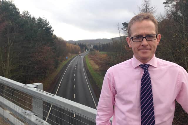 Borders MP John Lamont at the crossing of the B6355 and A1 between Ayton and Eyemouth.