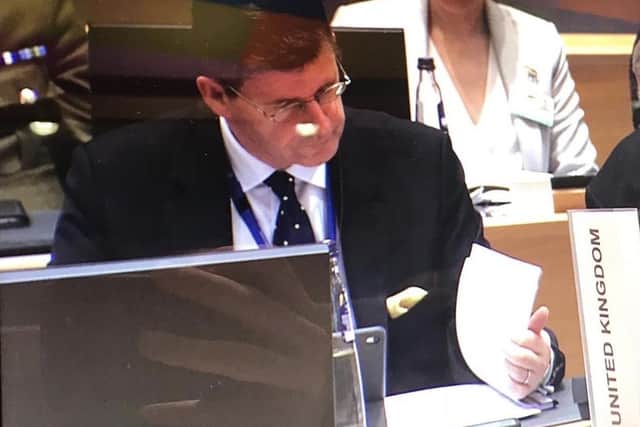 Paul Johnston hard at work in Brussells.
