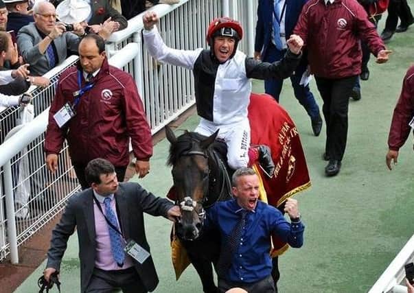 Michael Curran (in the blue shirt) with jockey Frankie Dettori and Golden Horn.