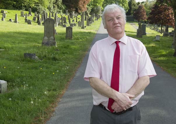 Councillor Davie Paterson at Wellogate Cemetery in Hawick.