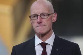 Deputy first minister and education secretary John Swinney delivering his ministerial statement on exam results in the Scottish Parliament yesterday, August 11. (Photo by Fraser Bremner/pool/Getty Images)