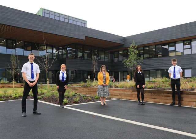 Pupils, from left: Duncan Little, Emma Brown, Cayley Webster and Jay Bathgate, flank head teacher Susan Oliver at the new campus.