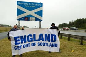 Nationalist activists James Connelly and Sean Clerkin staging a protest at the Scottish-English border north of Berwick in July. Image credit: Self Drive Vehicle Hire (SDVH) https://sdvh.co.uk/locations/