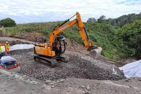 The embankment next to the collapsed section of the A68 is almost up to road level and the road is set to reopen early next week.