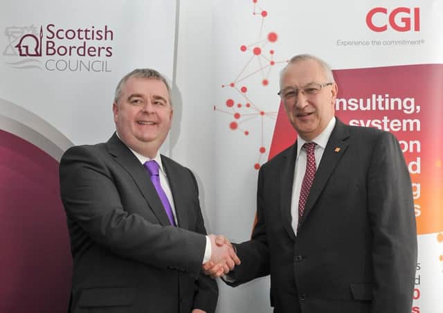 Council leader David Parker and CGI's UK president Tim Gregory secure the original deal in 2016.