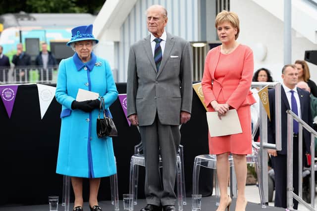 Queen Elizabeth II, accompanied by the Duke of Edinburgh and Nicola Sturgeon, declaring the Borders Railway open at Tweedbank in September 2015. (Photo by Chris Jackson/Getty Images)