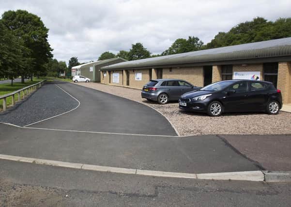The former Riverside Car Centre off the A68 in Jedburgh.