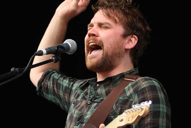 WOODFORD, AUSTRALIA - AUGUST 01:  Scott Hutchison of Frightened Rabbit performs on stage during Day 3 of the Splendour in the Grass music festival at Woodfordia on August 1, 2010 in Woodford, Australia.  (Photo by Mark Metcalfe/Getty Images)