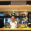 Alan Allison, behind the bar at Netherdale which now bears his name.